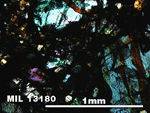 Thin Section Photo of Sample MIL 13180 in Cross-Polarized Light with 5X Magnification