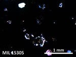 Thin Section Photo of Sample MIL 15305 in Cross-Polarized Light with 5X Magnification