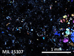 Thin Section Photo of Sample MIL 15307 in Cross-Polarized Light with 5X Magnification