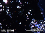 Thin Section Photo of Sample MIL 15408 in Cross-Polarized Light with 5X Magnification