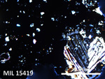 Thin Section Photo of Sample MIL 15419 in Cross-Polarized Light with 5X Magnification