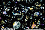 Thin Section Photo of Sample QUE 97003 in Cross-Polarized Light with 2.5X Magnification