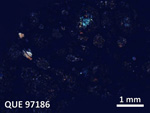 Thin Section Photo of Sample QUE 97186 in Cross-Polarized Light with  Magnification
