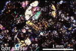 Thin Section Photo of Sample QUE 97294 in Cross-Polarized Light with 2.5X Magnification