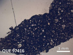 Thin Section Photo of Sample QUE 97416 in Plane-Polarized Light with  Magnification