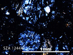 Thin Section Photo of Sample SZA 12444 in Cross-Polarized Light with 5X Magnification