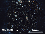 Thin Section Photo of Sample MIL 11285 in Cross-Polarized Light with 2.5X Magnification
