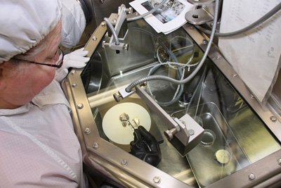 Lunar sample processor examines a sample in the Pristine Sample Laboratory