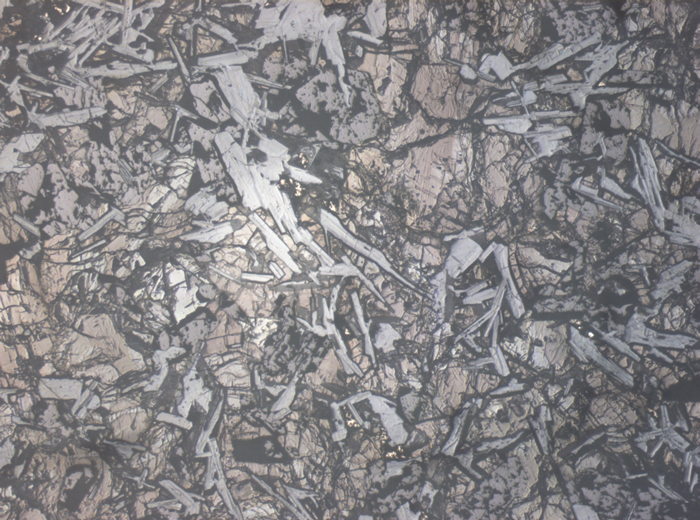 Thin Section Photograph of Apollo 11 Sample 10003,153 in Reflected Light at 2.5x Magnification and 2.85 mm Field of View (View #1)