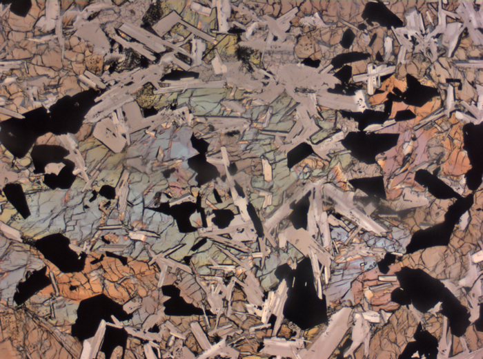 Thin Section Photograph of Apollo 11 Sample 10003,153 in Plane-Polarized Light at 2.5x Magnification and 2.85 mm Field of View (View #2)