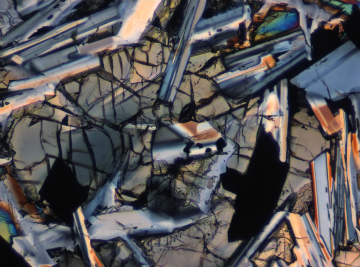 Thin Section Photograph of Apollo 11 Sample 10003,153 in Cross-Polarized Light at 10x Magnification and 0.7 mm Field of View (View #5)