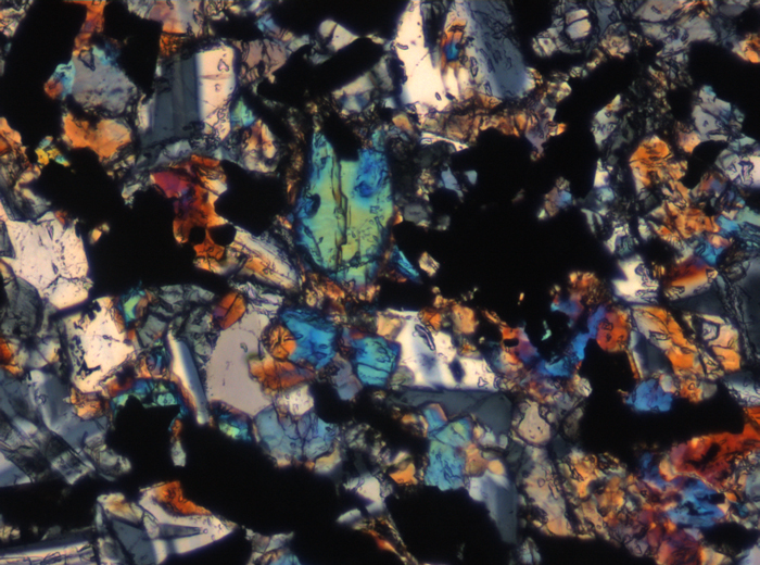 Thin Section Photograph of Apollo 11 Sample 10017,336 in Cross-Polarized Light at 10x Magnification and 0.7 mm Field of View (View #5)