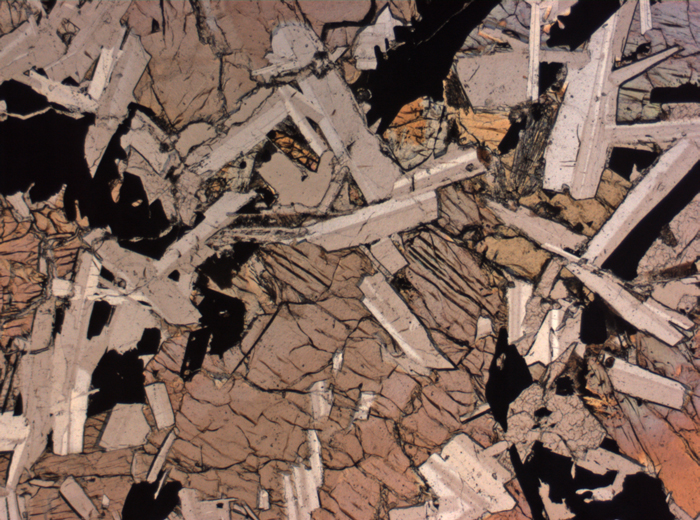 Thin Section Photograph of Apollo 11 Sample 10044,12 in Plane-Polarized Light at 2.5x Magnification and 2.85 mm Field of View (View #3)