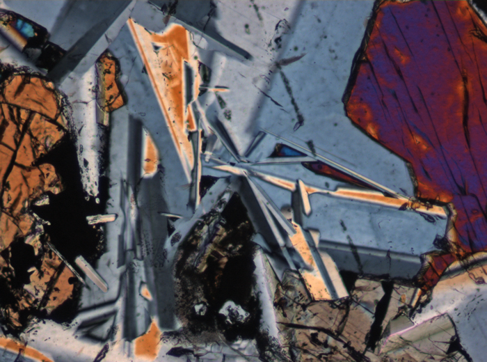 Thin Section Photograph of Apollo 11 Sample 10044,12 in Cross-Polarized Light at 10x Magnification and 0.7 mm Field of View (View #5)