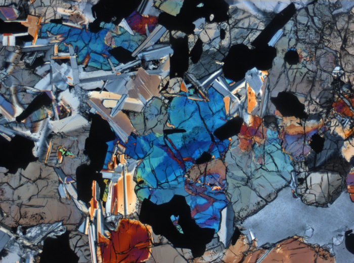 Thin Section Photograph of Apollo 11 Sample 10050,153 in Cross-Polarized Light at 2.5x Magnification and 2.85 mm Field of View (View #1)