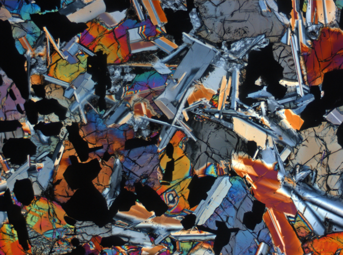 Thin Section Photograph of Apollo 11 Sample 10050,153 in Cross-Polarized Light at 2.5x Magnification and 2.85 mm Field of View (View #3)
