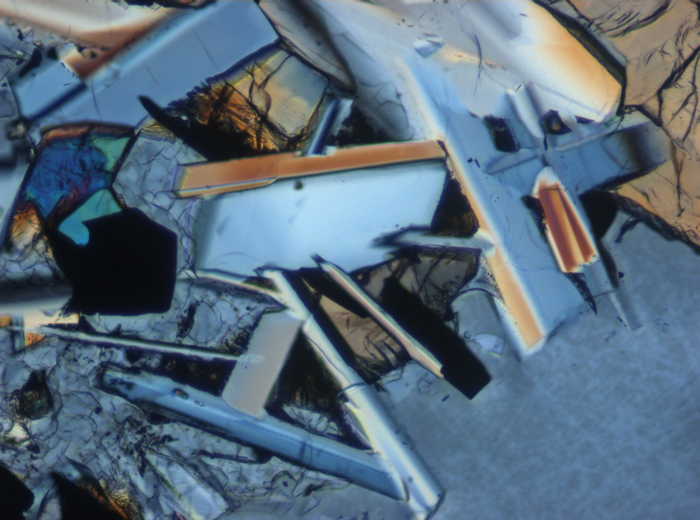 Thin Section Photograph of Apollo 11 Sample 10050,153 in Cross-Polarized Light at 10x Magnification and 0.7 mm Field of View (View #5)