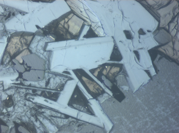 Thin Section Photograph of Apollo 11 Sample 10050,153 in Reflected Light at 10x Magnification and 0.7 mm Field of View (View #5)