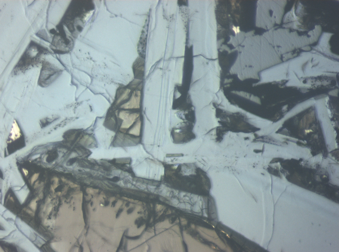 Thin Section Photograph of Apollo 11 Sample 10050,153 in Reflected Light at 10x Magnification and 0.7 mm Field of View (View #6)