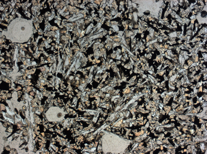 Thin Section Photograph of Apollo 11 Sample 10057,35 in Plane-Polarized Light at 2.5x Magnification and 2.85 mm Field of View (View #1)