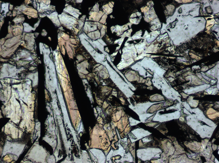 Thin Section Photograph of Apollo 11 Sample 10057,35 in Plane-Polarized Light at 10x Magnification and 0.7 mm Field of View (View #3)