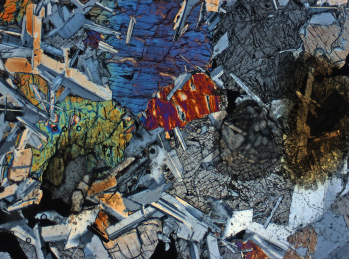 Thin Section Photograph of Apollo 11 Sample 10058,46 in Cross-Polarized Light at 2.5x Magnification and 2.85 mm Field of View (View #4)