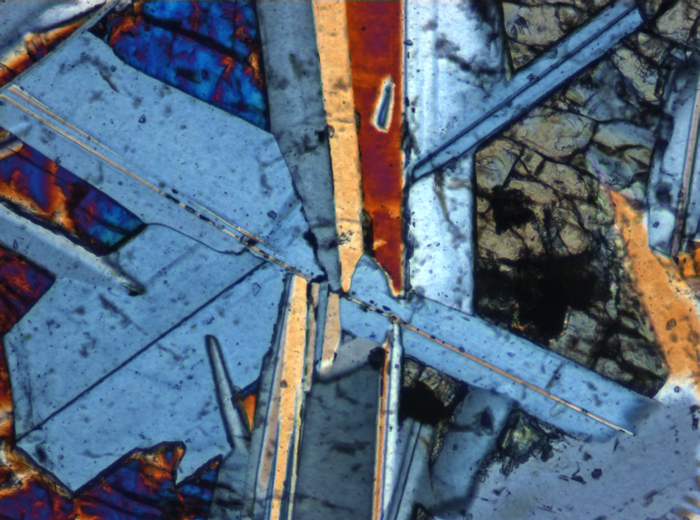 Thin Section Photograph of Apollo 11 Sample 10058,46 in Cross-Polarized Light at 10x Magnification and 0.7 mm Field of View (View #6)