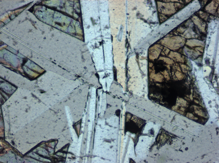 Thin Section Photograph of Apollo 11 Sample 10058,46 in Plane-Polarized Light at 10x Magnification and 0.7 mm Field of View (View #6)