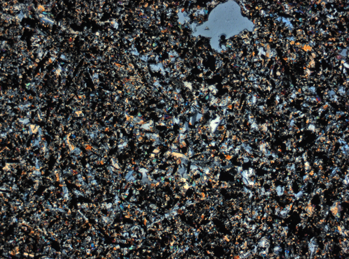 Thin Section Photograph of Apollo 11 Sample 10069,13 in Cross-Polarized Light at 2.5x Magnification and 2.85 mm Field of View (View #1)