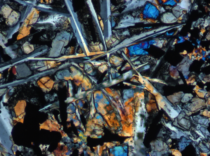 Thin Section Photograph of Apollo 11 Sample 10069,13 in Cross-Polarized Light at 10x Magnification and 0.7 mm Field of View (View #4)