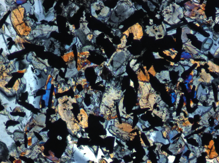 Thin Section Photograph of Apollo 11 Sample 10069,13 in Cross-Polarized Light at 10x Magnification and 0.7 mm Field of View (View #5)