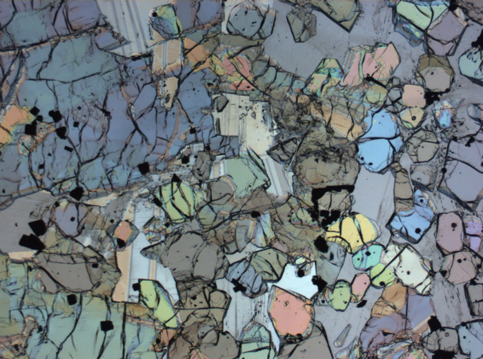 Thin Section Photograph of Apollo 12 Sample 12005,57 in Plane-Polarized Light at 2.5x Magnification and 2.85 mm Field of View (View #22)
