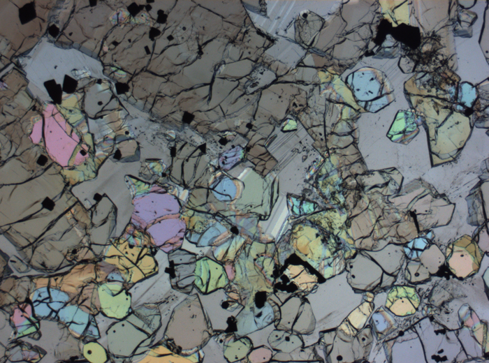 Thin Section Photograph of Apollo 12 Sample 12005,57 in Plane-Polarized Light at 2.5x Magnification and 2.85 mm Field of View (View #31)