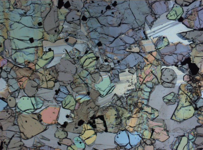 Thin Section Photograph of Apollo 12 Sample 12005,57 in Plane-Polarized Light at 2.5x Magnification and 2.85 mm Field of View (View #38)