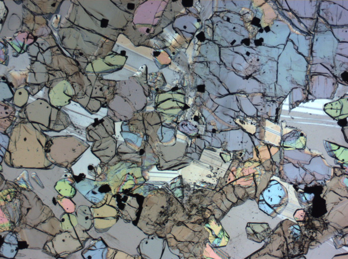 Thin Section Photograph of Apollo 12 Sample 12005,57 in Plane-Polarized Light at 2.5x Magnification and 2.85 mm Field of View (View #44)