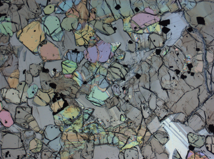 Thin Section Photograph of Apollo 12 Sample 12005,57 in Plane-Polarized Light at 2.5x Magnification and 2.85 mm Field of View (View #52)