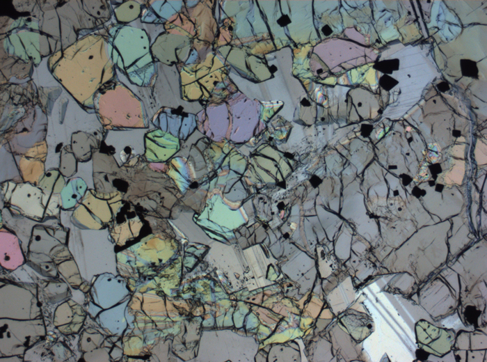 Thin Section Photograph of Apollo 12 Sample 12005,57 in Plane-Polarized Light at 2.5x Magnification and 2.85 mm Field of View (View #53)