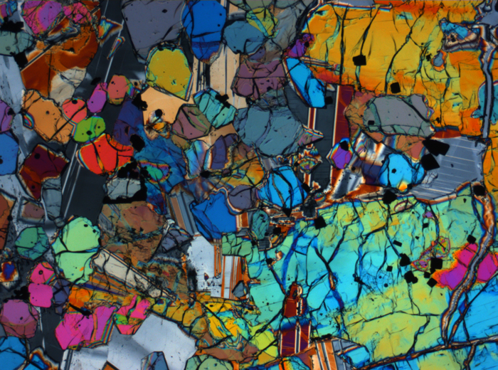 Thin Section Photograph of Apollo 12 Sample 12005,57 in Cross-Polarized Light at 2.5x Magnification and 2.85 mm Field of View (View #58)