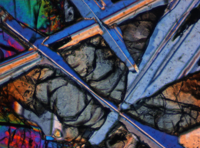Thin Section Photograph of Apollo 12 Sample 12006,10 in Cross-Polarized Light at 10x Magnification and 0.7 mm Field of View (View #5)