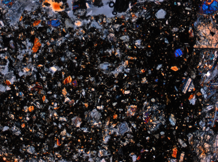 Thin Section Photograph of Apollo 12 Sample 12010,28 in Cross-Polarized Light at 2.5x Magnification and 2.85 mm Field of View (View #1)