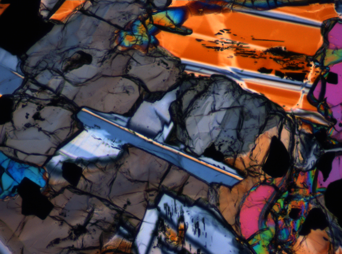 Thin Section Photograph of Apollo 12 Sample 12016,14 in Cross-Polarized Light at 10x Magnification and 0.7 mm Field of View (View #5)