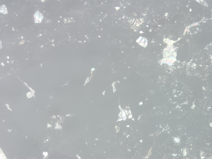 Thin Section Photograph of Apollo 12 Sample 12034,32 in Reflected Light at 5x Magnification and 2.3 mm Field of View (View #2)
