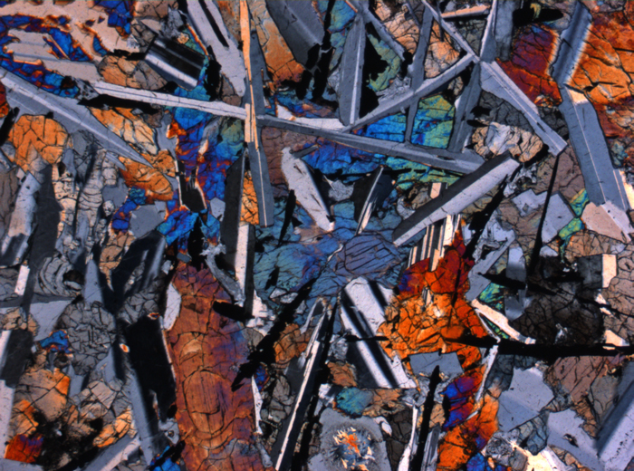 Thin Section Photograph of Apollo 12 Sample 12038,64 in Cross-Polarized Light at 2.5x Magnification and 2.85 mm Field of View (View #2)