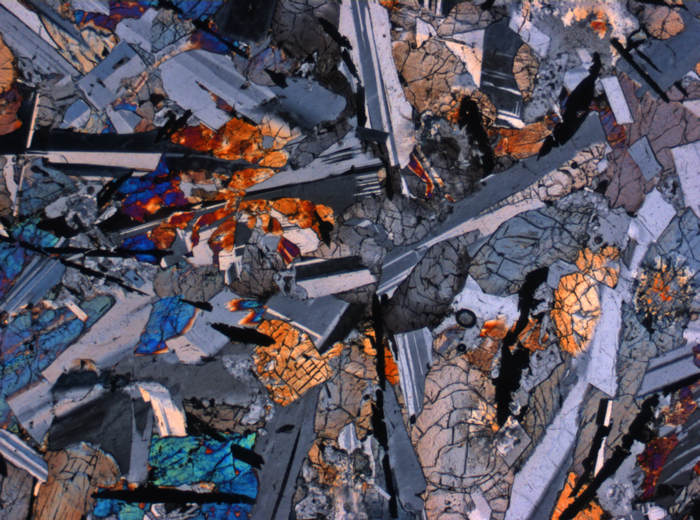 Thin Section Photograph of Apollo 12 Sample 12038,64 in Cross-Polarized Light at 2.5x Magnification and 2.85 mm Field of View (View #3)