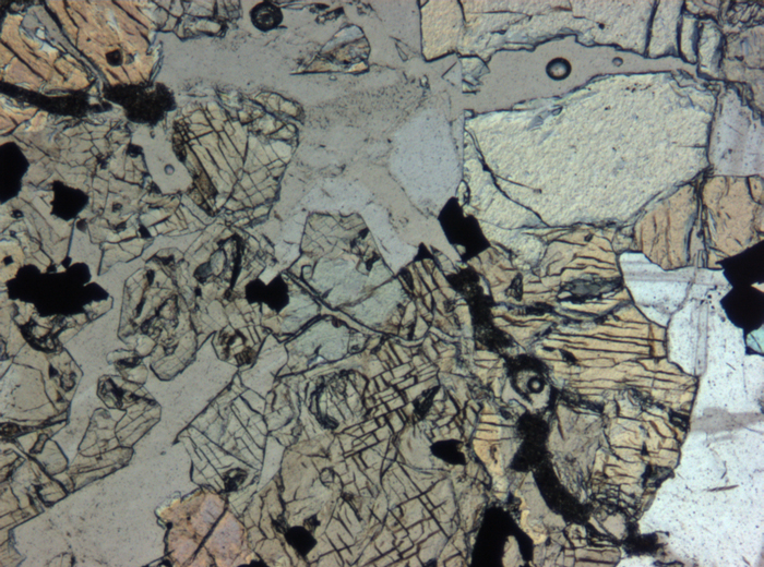 Thin Section Photograph of Apollo 12 Sample 12040,2 in Plane-Polarized Light at 5x Magnification and 1.4 mm Field of View (View #7)