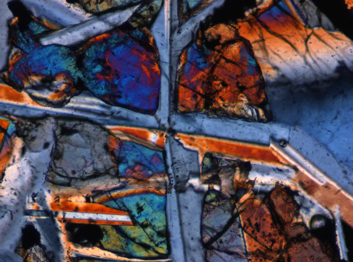 Thin Section Photograph of Apollo 12 Sample 12047,8 in Cross-Polarized Light at 10x Magnification and 0.7 mm Field of View (View #4)