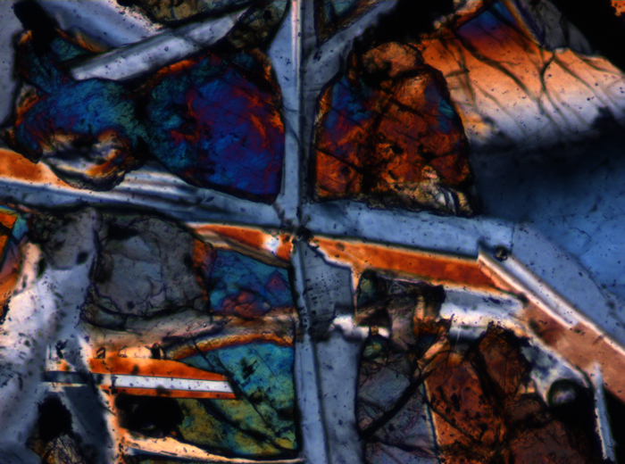 Thin Section Photograph of Apollo 12 Sample 12047,8 in Cross-Polarized Light at 10x Magnification and 0.7 mm Field of View (View #4)