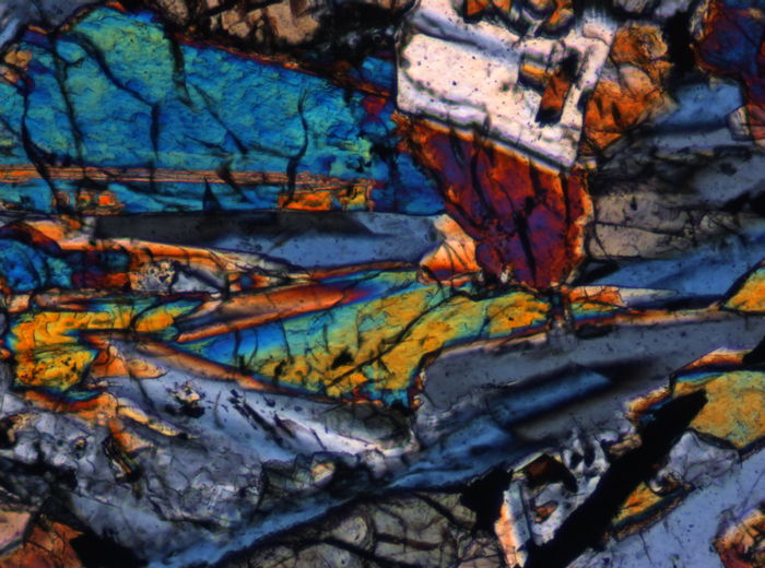 Thin Section Photograph of Apollo 12 Sample 12055,7 in Cross-Polarized Light at 10x Magnification and 0.7 mm Field of View (View #4)