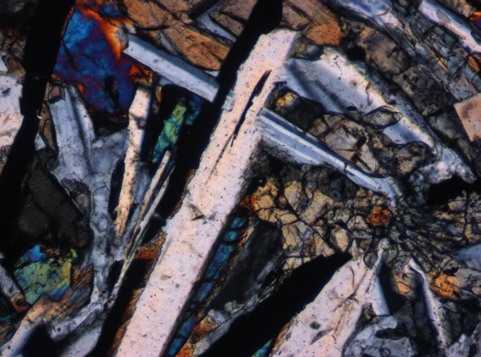 Thin Section Photograph of Apollo 12 Sample 12055,7 in Cross-Polarized Light at 10x Magnification and 0.7 mm Field of View (View #5)