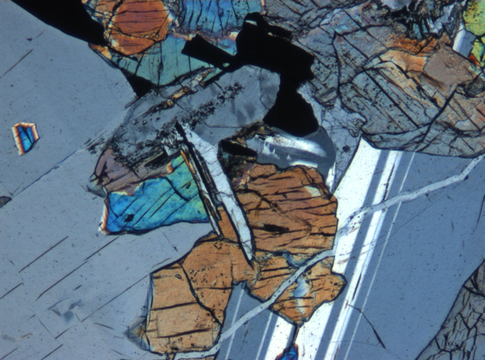 Thin Section Photograph of Apollo 12 Sample 12064,6 in Cross-Polarized Light at 5x Magnification and 1.4 mm Field of View (View #7)